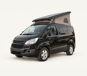 Black Ford Transit Custom Nugget with the pop-top roof raised