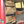 Load image into Gallery viewer, Roll-up tool organizer with wrenches hanging on a car door
