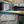 Load image into Gallery viewer, Interior of a van with insulation for windows and curtains
